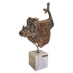 Aurelio Teno (1927/2013) Escultura en forma de pez, piedra natural y Bronce