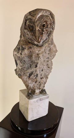 Aurelio Teno (1927/2013) Scultura a forma di gufo, pietra naturale e bronzo