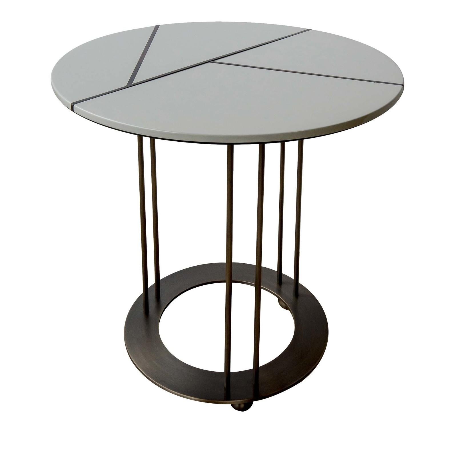 Stunning in its simplicity, this superb side table is defined by meticulous details. The round wooden top has a celadon-hued glossy polyurethane lacquer with a geometric inlay pattern in ebony slats. The angularity of the inlay balances the open