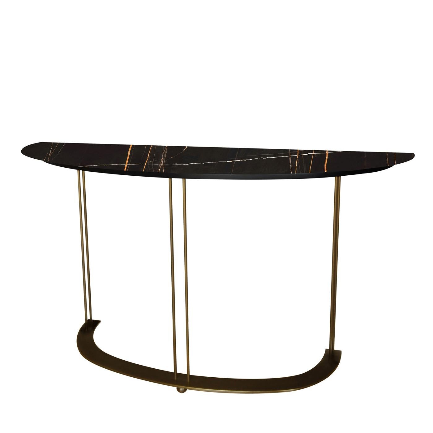 This console will be a magnificent addition to a sophisticated hallway, entryway or living room, thanks to its combination of refined materials of strong visual allure. Boasting a demilune silhouette both top and base, its structure comprises three