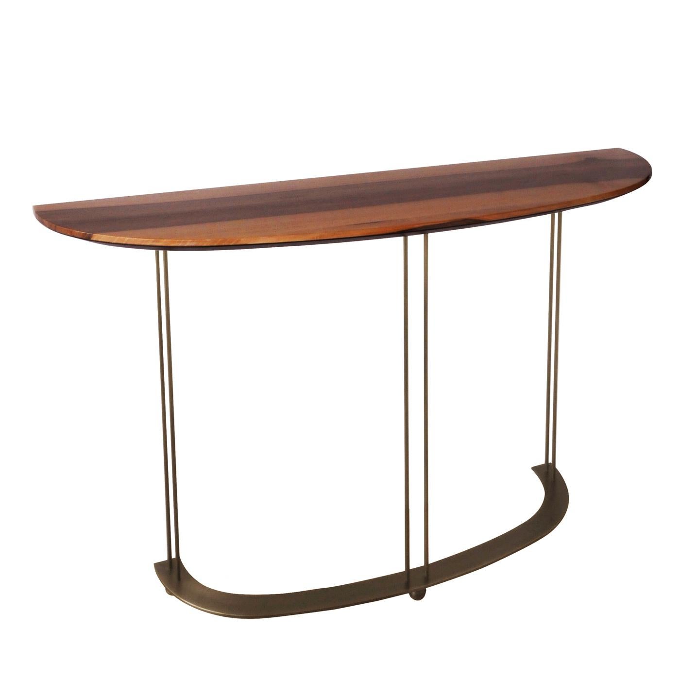 Evoking natural hues and textures, this console will be an elegant addition to an entryway, hallway or living room. Highly customizable in materials and finishes, this version features a demilune shaped top made of walnut Canaletto ebony and a