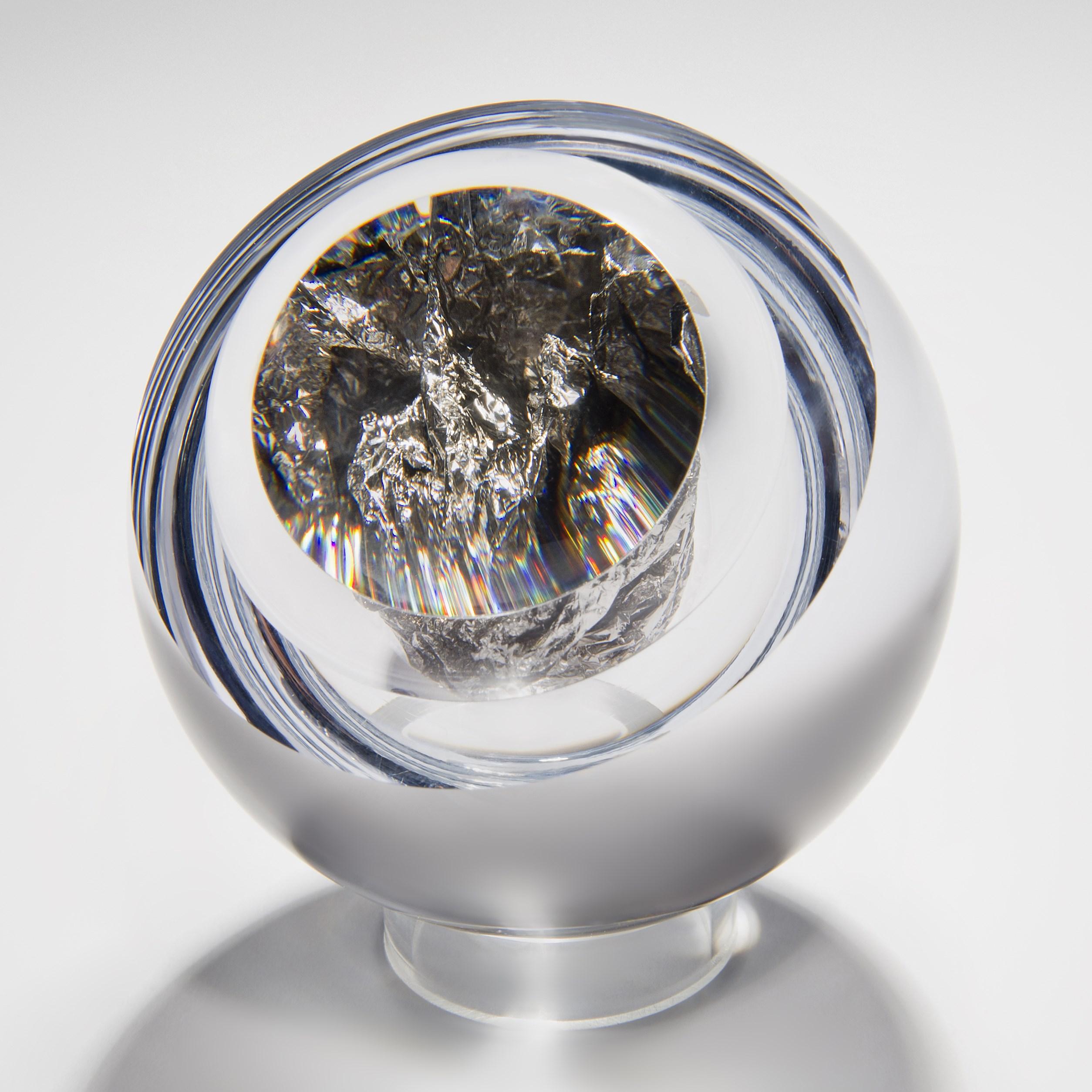 'Auri No 30 with Platinum' is a handblown and cut glass sculpture with platinum leaf, created by the British artist, Anthony Scala.

The Auri Collection is available in 8 different sizes from approx 4cm to 20cm ø, with around 22 choices of silver