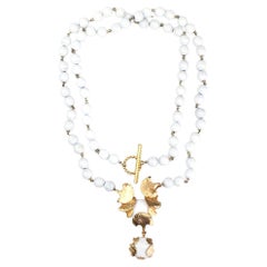 Collier Aurientis en perles blanches et bronze doré, années 1980