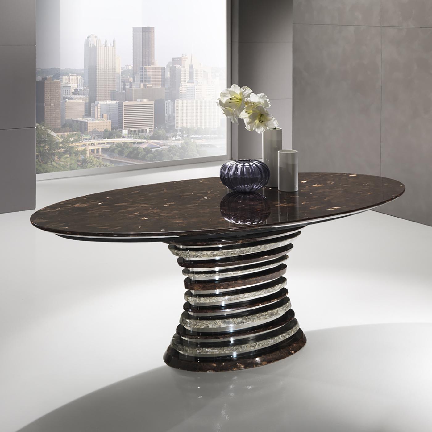 Part of the signature Auriga Collection, this astonishing dining table is handcrafted of Crystal Stone®, a crystalline alabaster found exclusively in Italy's Romagna region, which the Ballarini family has been quarrying and sculpting for