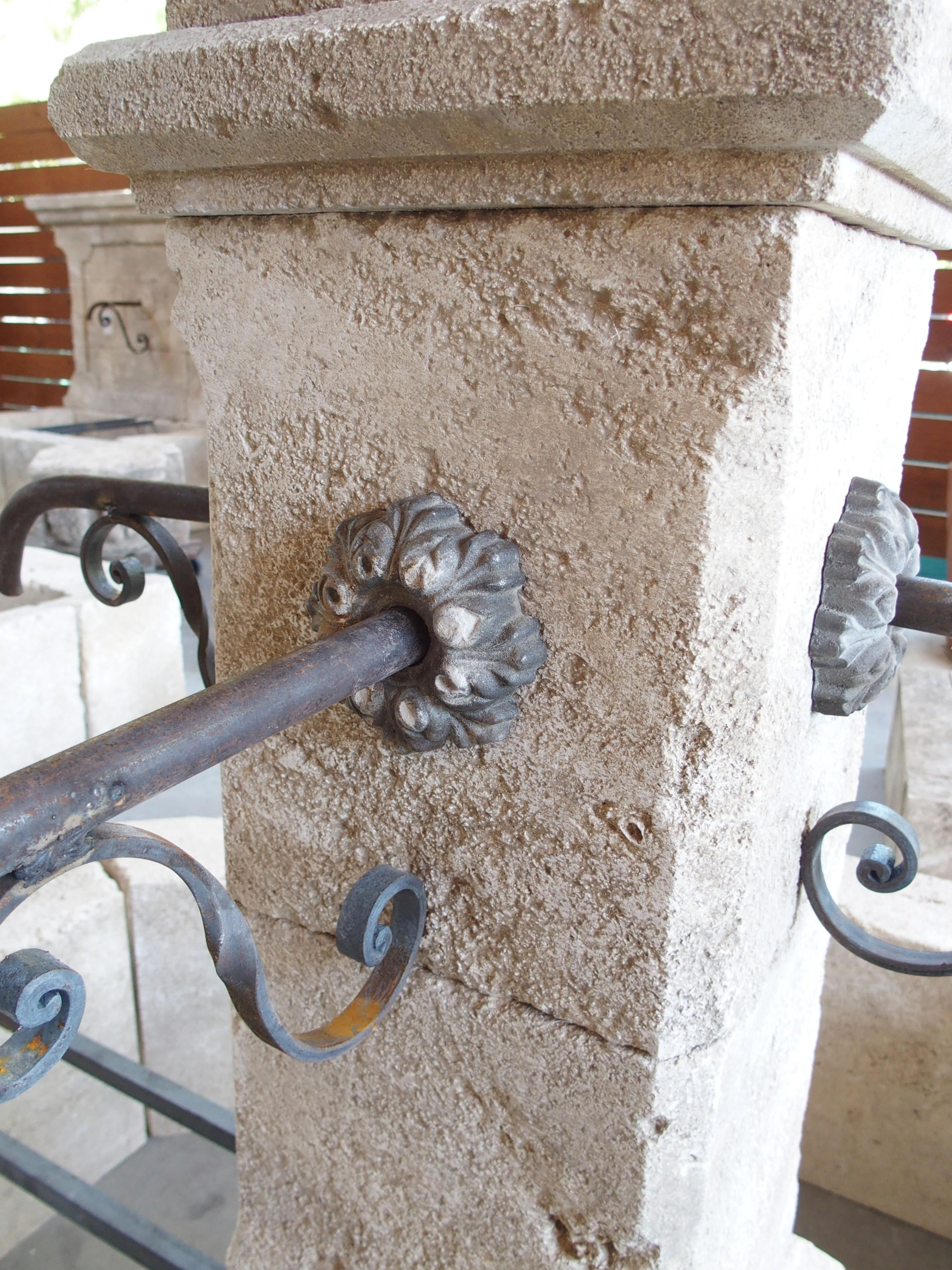 Measuring 62 1/4 inches in diameter, this French center fountain is a great size for a medium expanse.  Hand-carved in Provence using 14 pieces of limestone, the octagonal basin surrounds a rectilinear column with four scrolled spouts and rosette