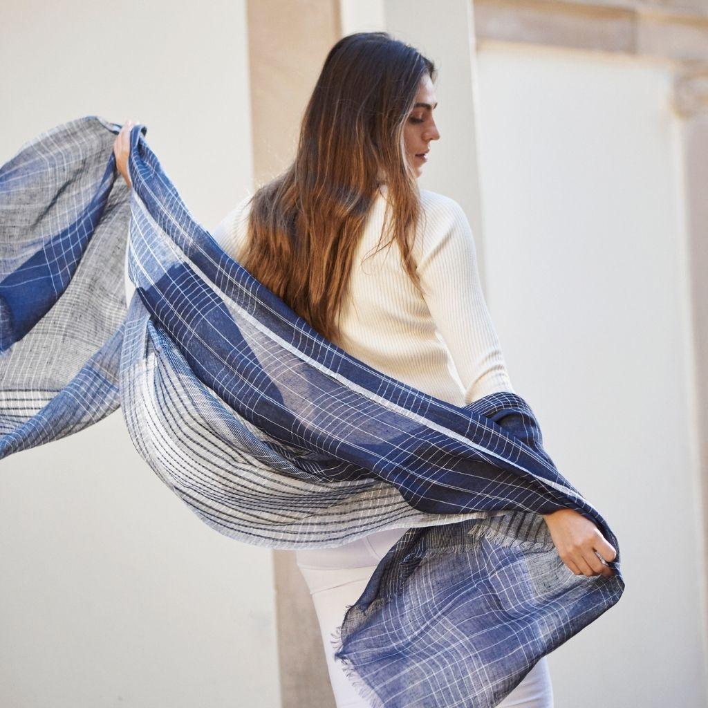 Custom design by Studio Variously, Auro Navy is a light weight soft linen scarf. It is finely handwoven by master artisans in Nepal.  

A sustainable design brand based out of Michigan, Studio Variously exclusively collaborates with artisan