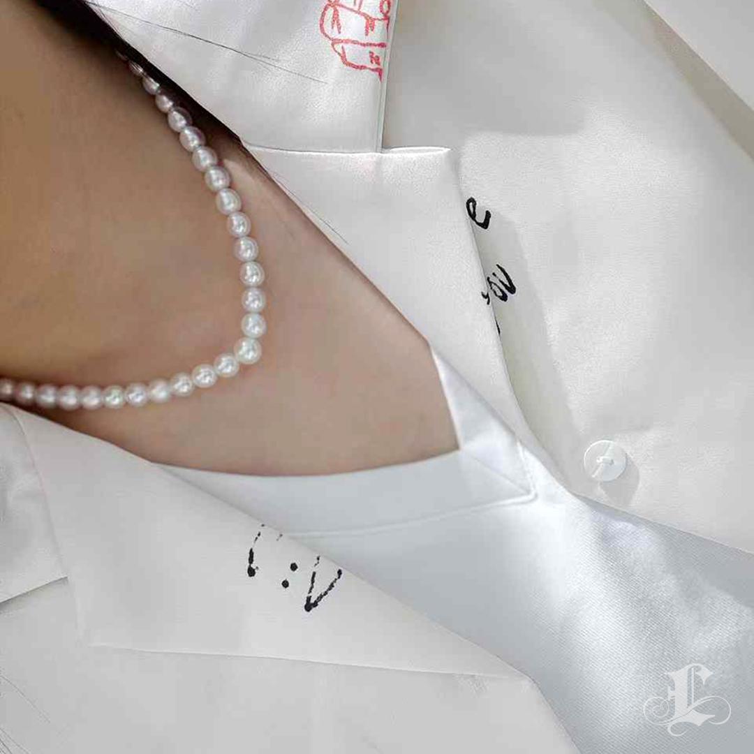 This elegant necklace showcases top-grade 6–7mm Japanese Akoya pearls, known for their mirror-like luster and subtle iridescence. Each pearl is near-round with minimal blemishes, carefully matched for a refined and balanced look. The necklace