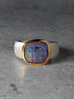 Aurora Boulder Opal 18K gold and silver ring red blue green yellow opalescences
