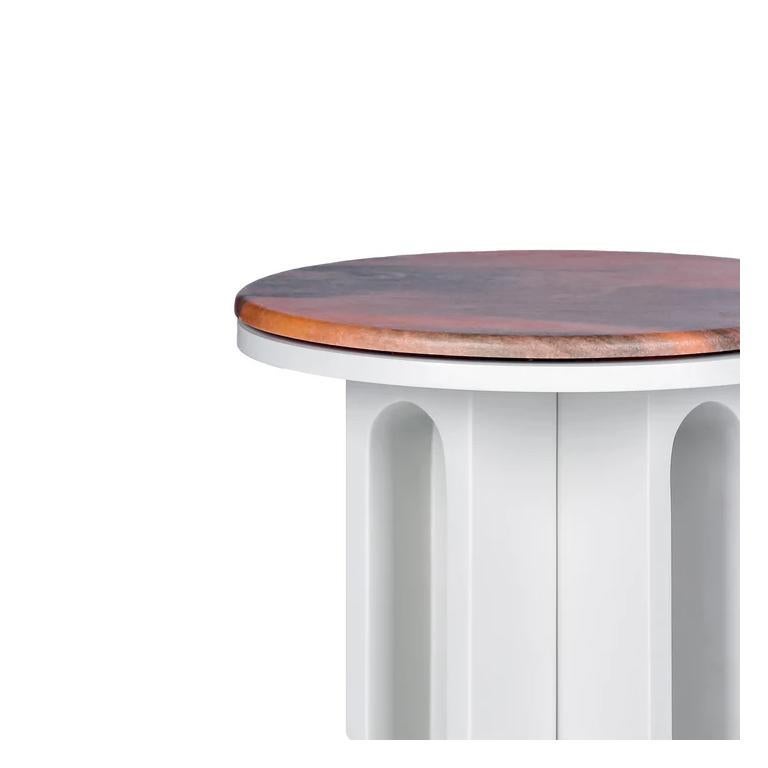 A refined blend of modern geometry and natural elements, the Aurora End Table is designed to be a statement piece for any luxurious space. Featuring a meticulously crafted stone top with warm undertones, it offers a visually striking contrast