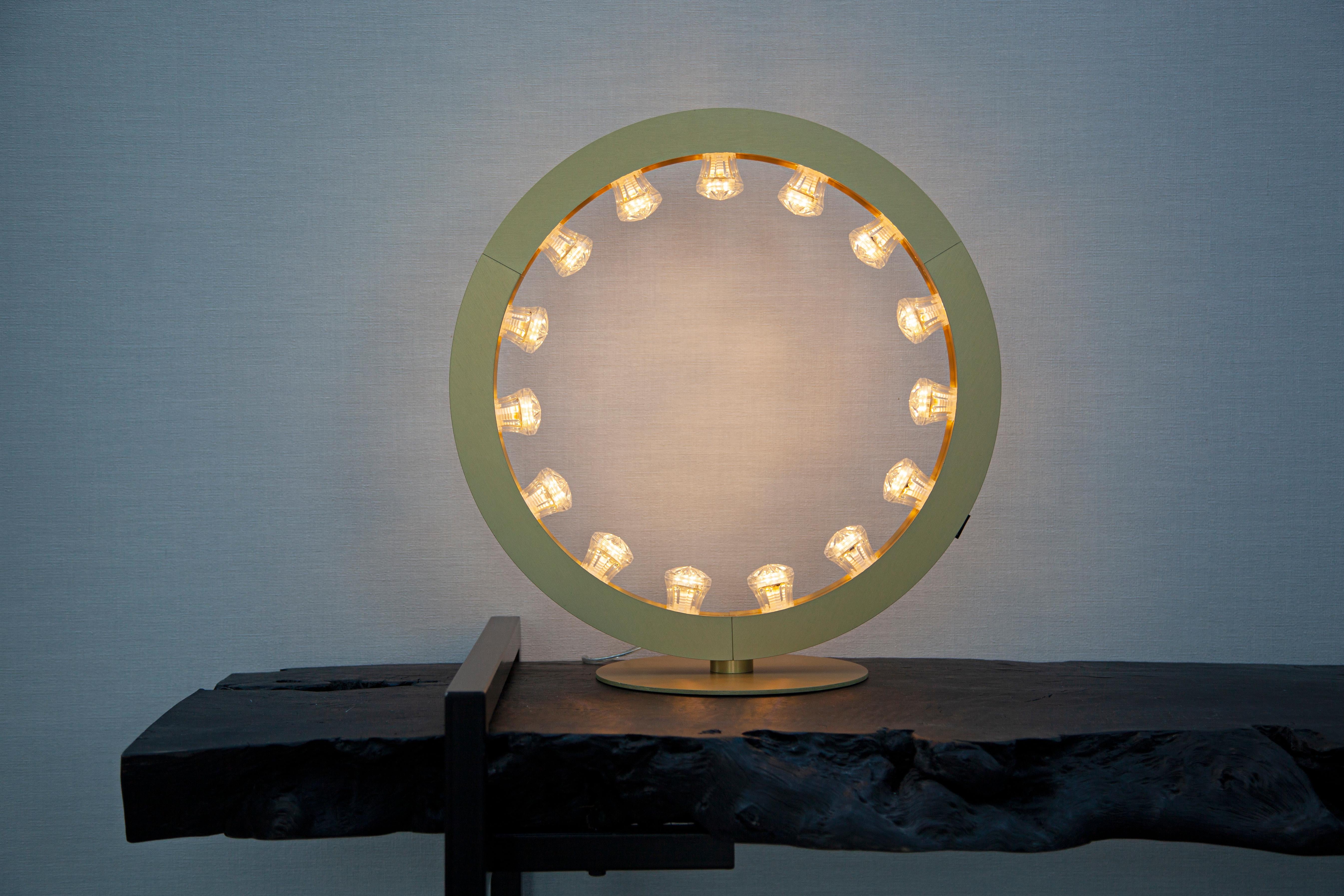 Aurora Mini Circular Anodized Black Table Lamp by JSPR
Designed by Jasper van Grootel.
Dimensions: Ø 50 x H 4 cm.
Materials: Anodized aluminum.

Handmade in The Netherlands. Available in seven different luxurious anodized colors. All our lamps can