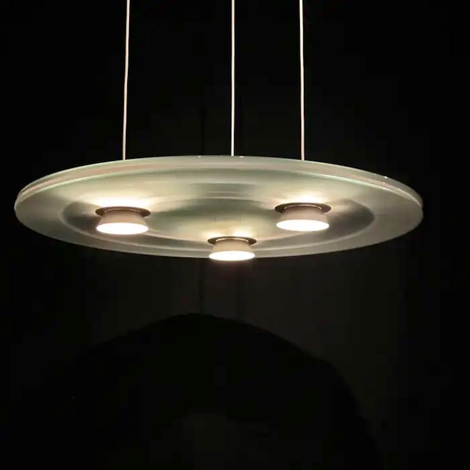SATURDAY SALE

We have three Aurora pendants in the elusive white color, priced individually.
Perry King & Santiago Miranda designed the 'Aurora' pendant light in 1982 for Arteluce, by then a division of FLOS.
The Aurora provides direct and diffused