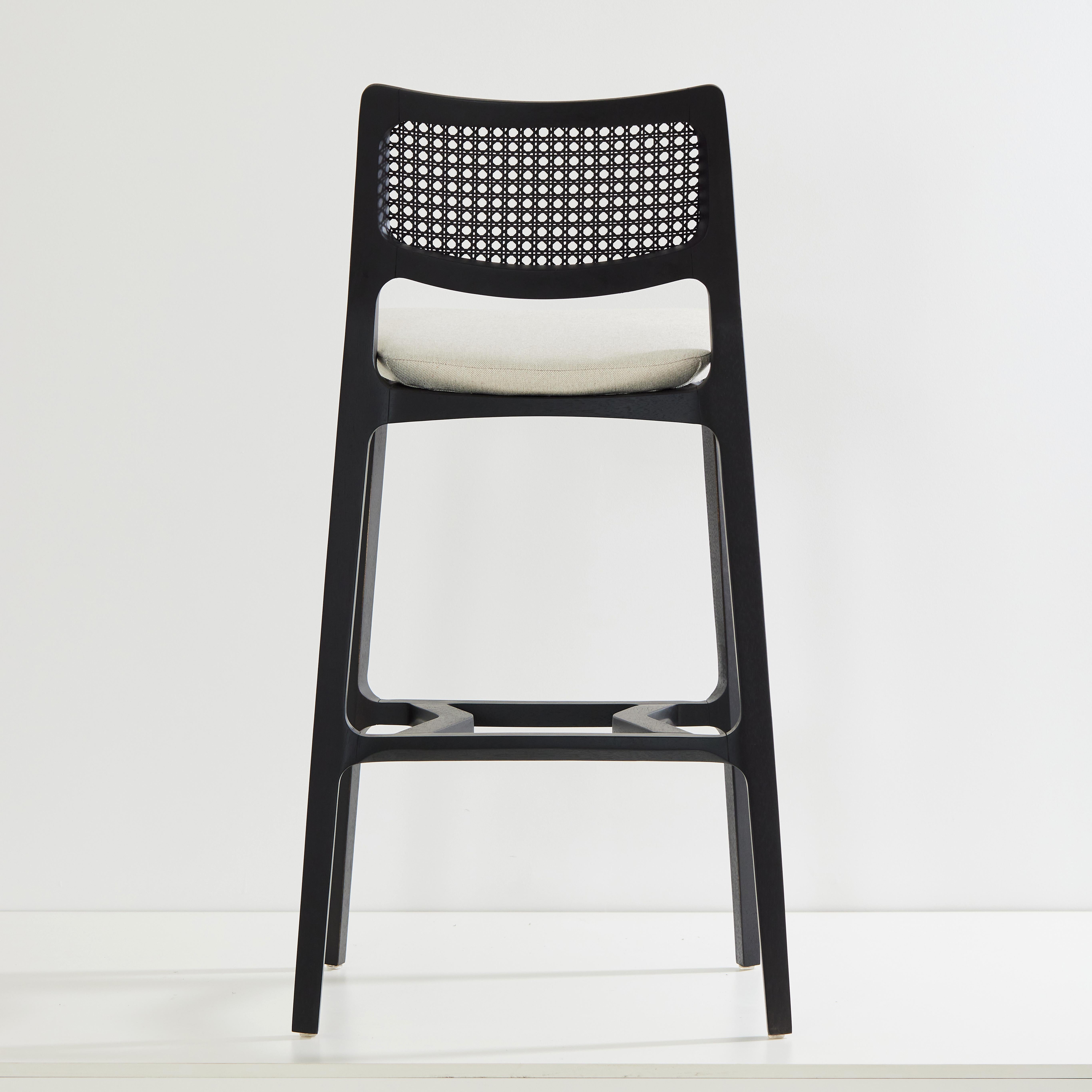 Brazilian Aurora stool, black solid wood, black caning back, off white textiles seating For Sale