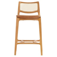 Aurora stool, light honey solid wood, natural caning back, camel leather seating
