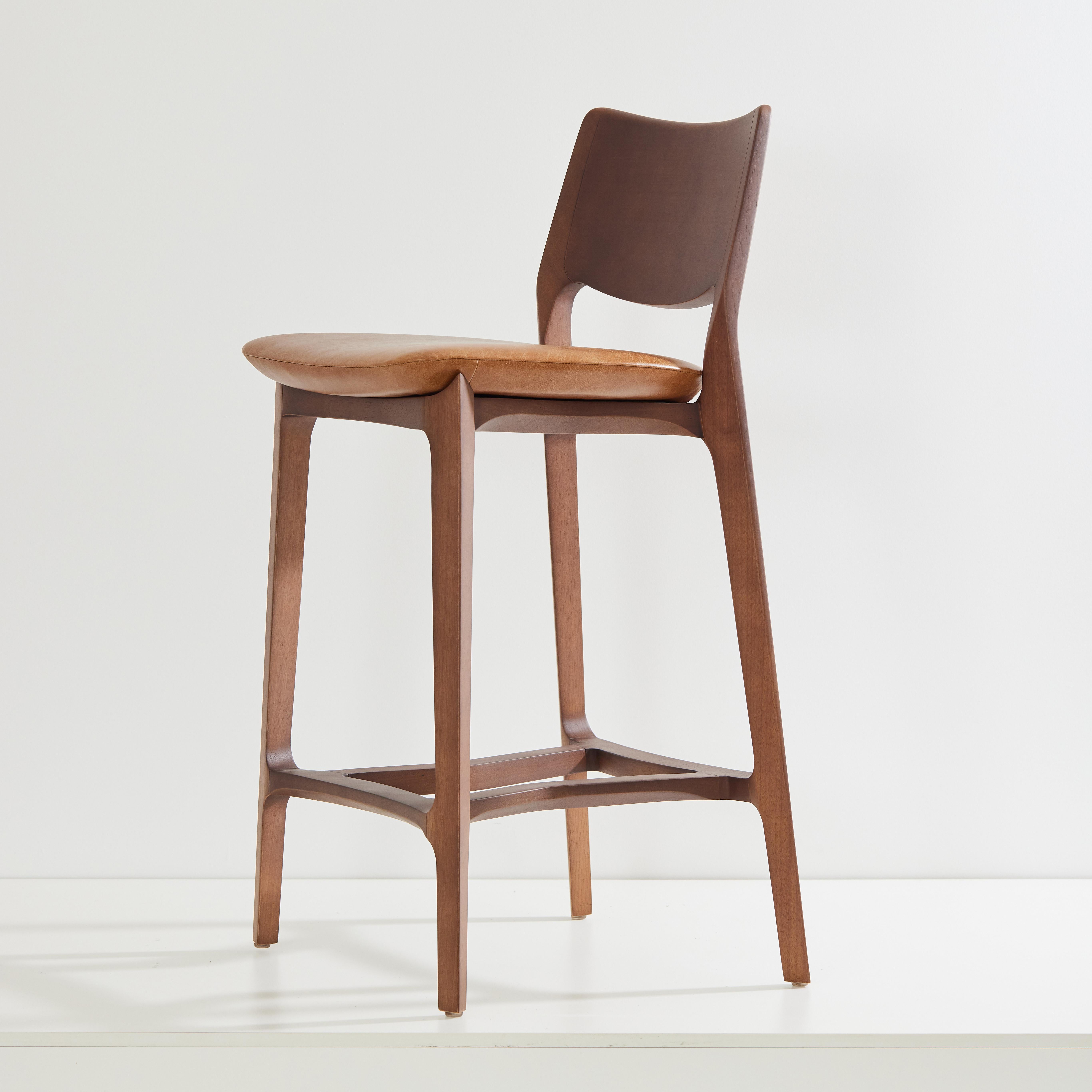 Post-Modern Aurora stool, walnut solid wood finish, solid back, camel leather seating For Sale