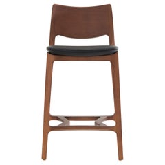 Aurora stool, walnut solid wood finish, solid back black natural leather seating