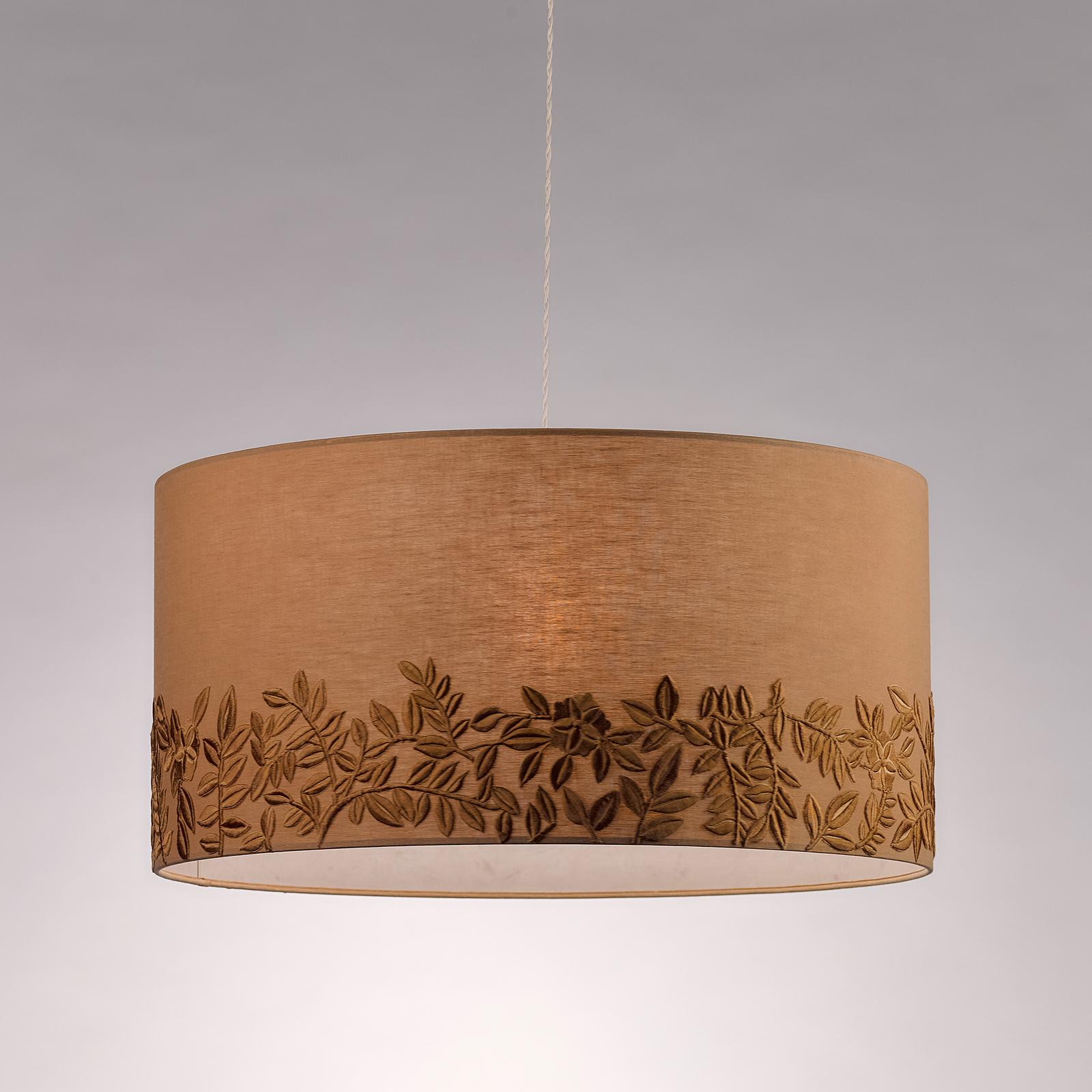 Elegant and timeless, this shade will fit both a ceiling and a floor lamp to infuse any room in the house with retro-chic charm. Its cylindrical shape is crafted of linen in a stone wash golden-sand color that is warm and welcoming. The bottom of