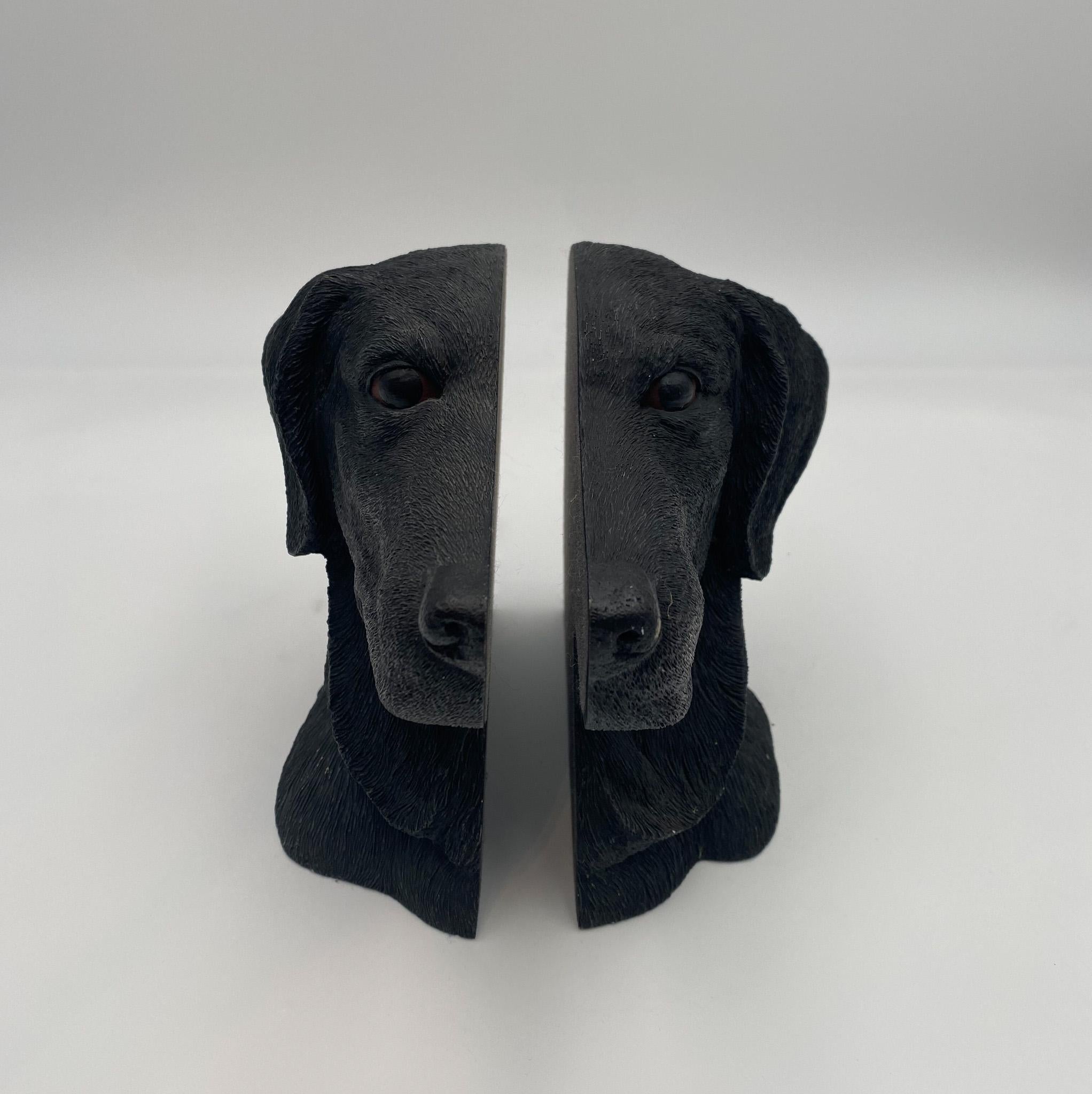 Aus-Ben Studios Black Labrador Dog Head Bookends, United States, circa 1987.  Original label to the bottom of one example. 