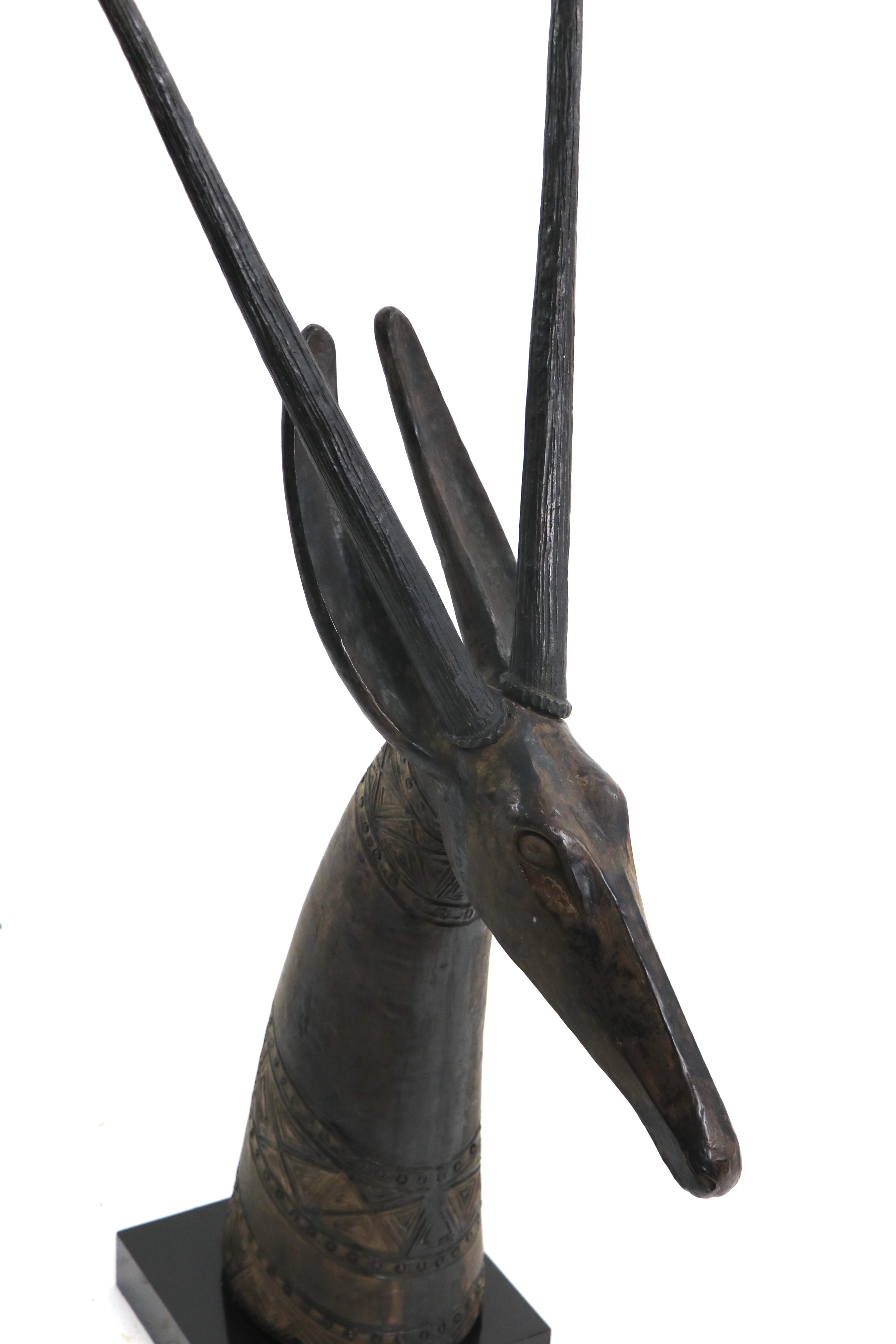 Exceptional Austin Products cast ceramic gazelle mount. This example is in excellent original condition, beautiful patina, free of damage or repairs. This hard to find item makes a statement of chic voguish style.