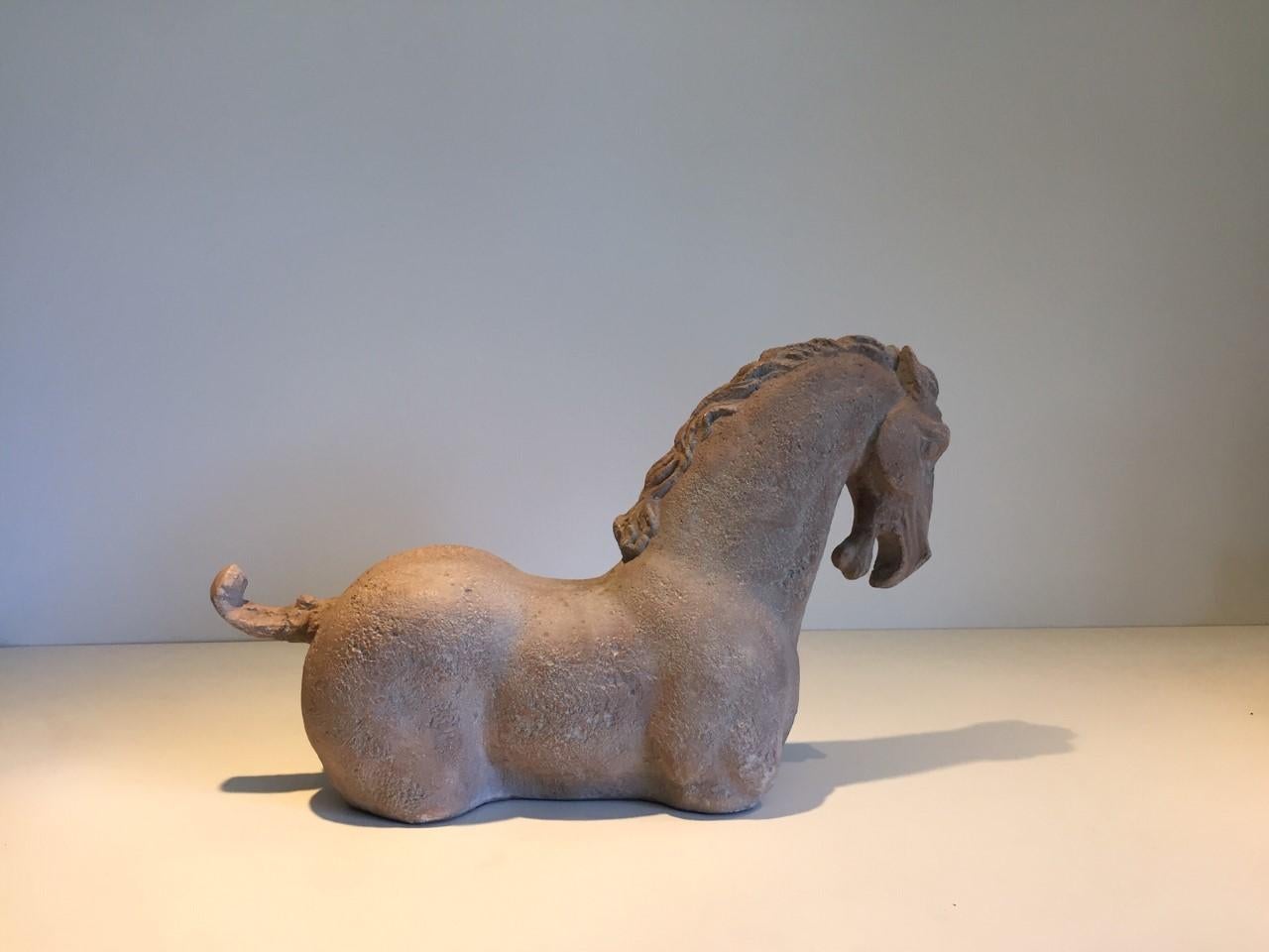 Austin sculptures collection: carved sculpture of a T'ang style horse - each piece is handcrafted and unique, dated 1961. Inscribed on lower rear side 