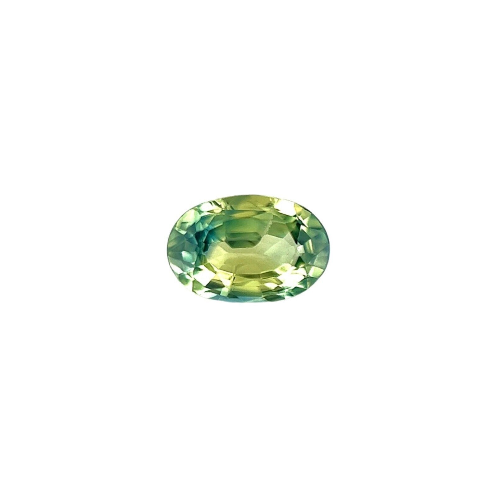 Australienischer Teilfarbener Saphir 0,67 Karat Gelbgrüner Ovalschliff Edelstein 6.3x4.2 mm