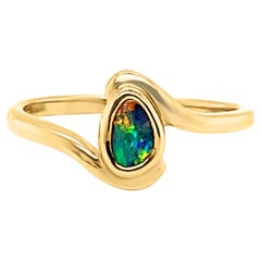 Natural Untreated Australian 0.30ct Black Opal Ring in 18K Yellow Gold 