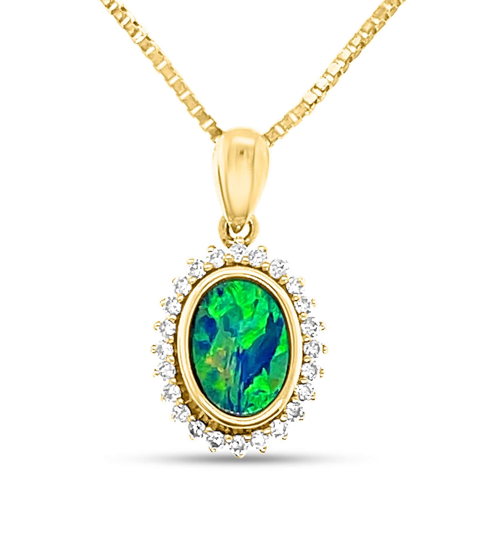 Bold and undeniably grandiose, the ‘Valeria’ opal doublet pendant (0.48 ct) is a piece intended to impress with the gemstone’s intricate play-of-colour nestled by a halo of brilliant cut dainty diamonds. This 18K yellow gold pendant featuring a