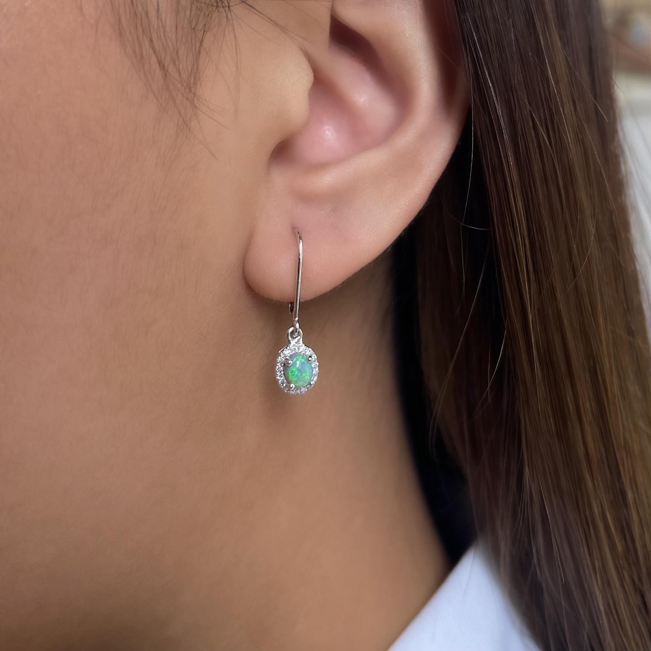 “The Snow Queen’” opal earrings are a fairy tale that comes to life. These earring features black opals (0.70ct) from Lightning Ridge and is set in an 18K white gold with a diamond setting. elegant and utterly sophisticated would make a perfect