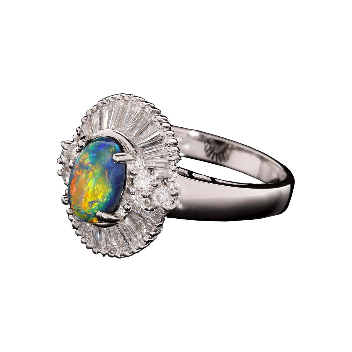 A very special ring made for that very special occasion - one where your heart is given with all the love you have to give. An Australian opal with rich, bright colours that beam in any light; diamonds that glow and twinkle with every movement.