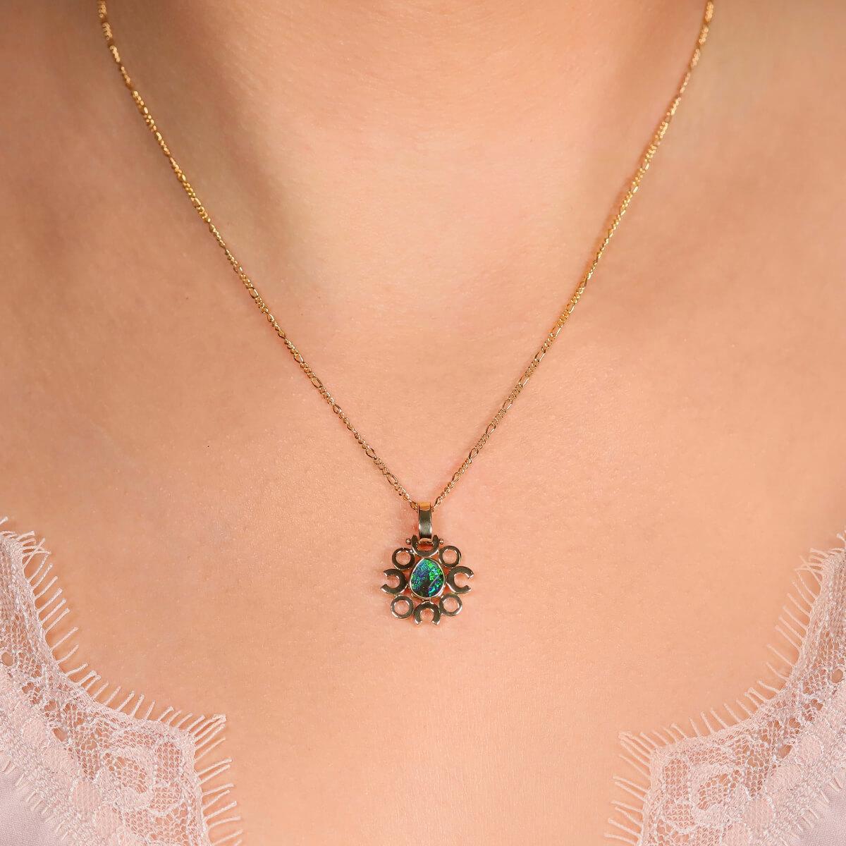 A bright green and blue boulder opal at its heart, this cute and quirky pendant makes for the perfect everyday necklace. Set in solid 18K yellow gold and paired with a solid 18K gold chain, it will brighten your day every time you catch a glimpse of