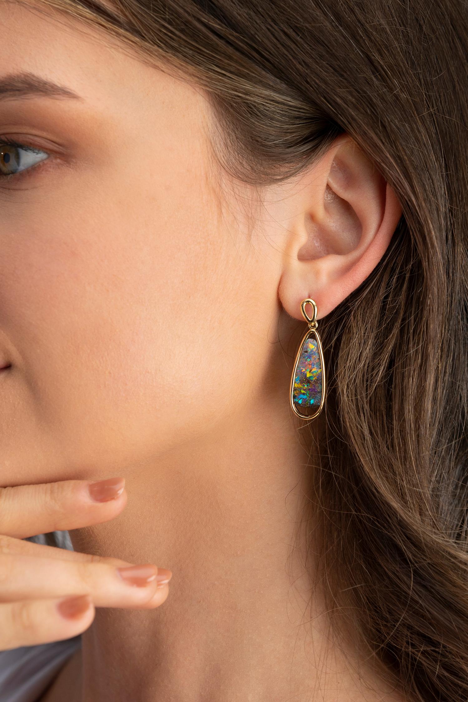 “Constellations” opal earrings capture the ethereal beauty of the night sky. This perfect pair of galaxy-patterned boulder opals (10.96ct) from Winton is crafted in our classic 18K yellow gold. Elegant and refined, these earrings are guaranteed to