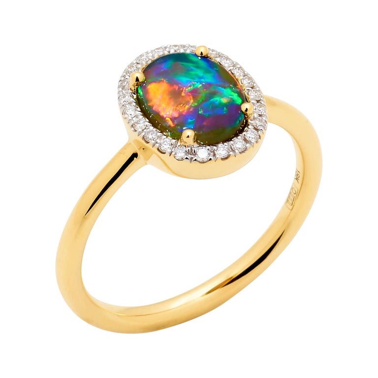 Natural Untreated Australian 1.29ct Black Opal Ring in 18k Yellow Gold For Sale