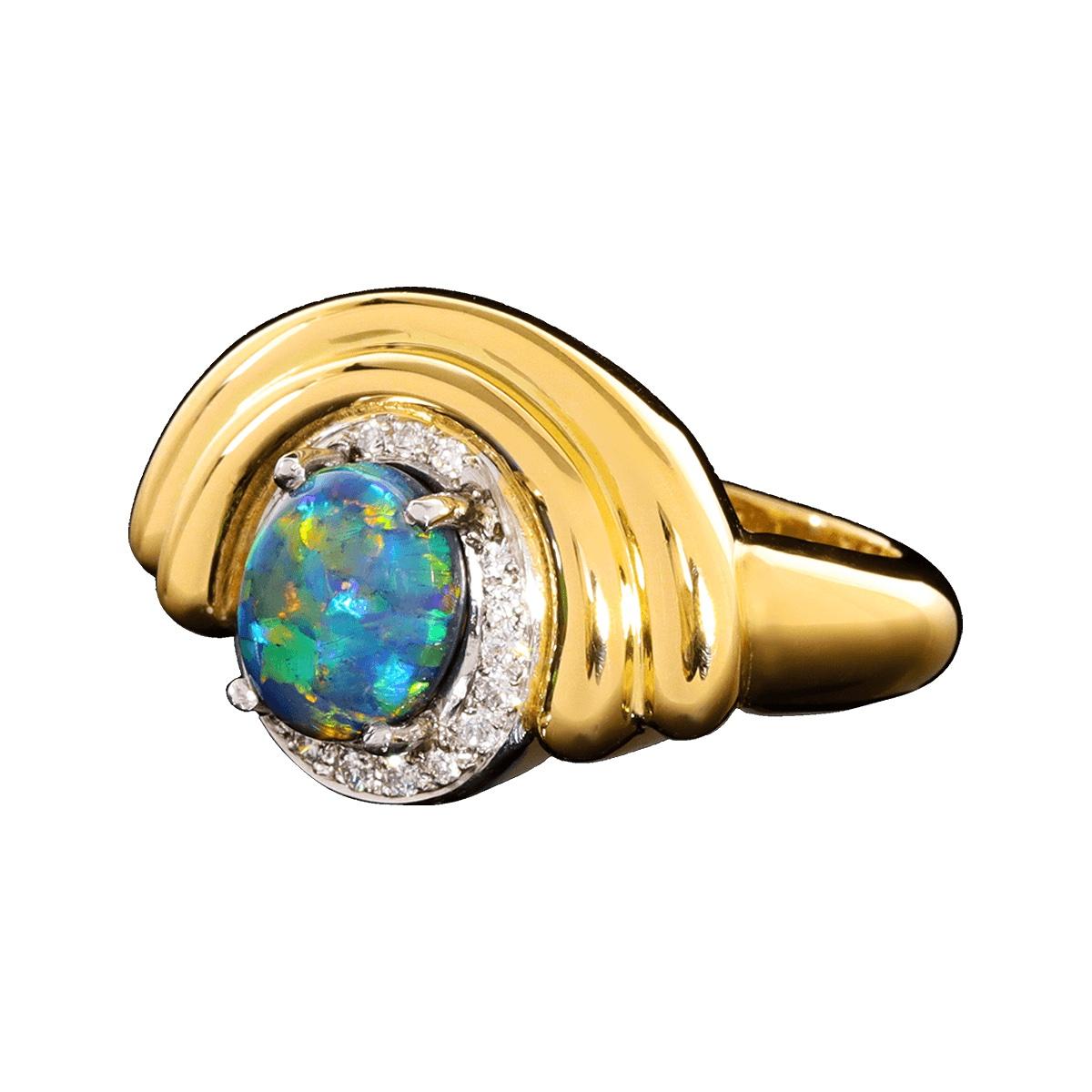 Art Deco is always in style. It represents symmetry and balance using geometry as its guide. Timeless beauty showcasing the magnificence of solid Australian Black Opal, sparkling white diamond surround, and a ring of solid 18K gold.

Master-crafted