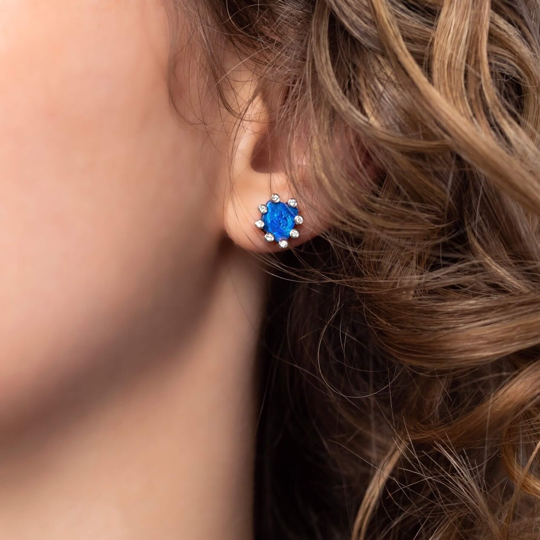 “Yes & No” opal earrings balance the contemporary against the classic. Beautiful deep blue boulder opals (2.15ct) and frosty diamond dots in a cool 18K white gold setting make this piece glamour and fun rolled into one. Designed by Renata Bernard.