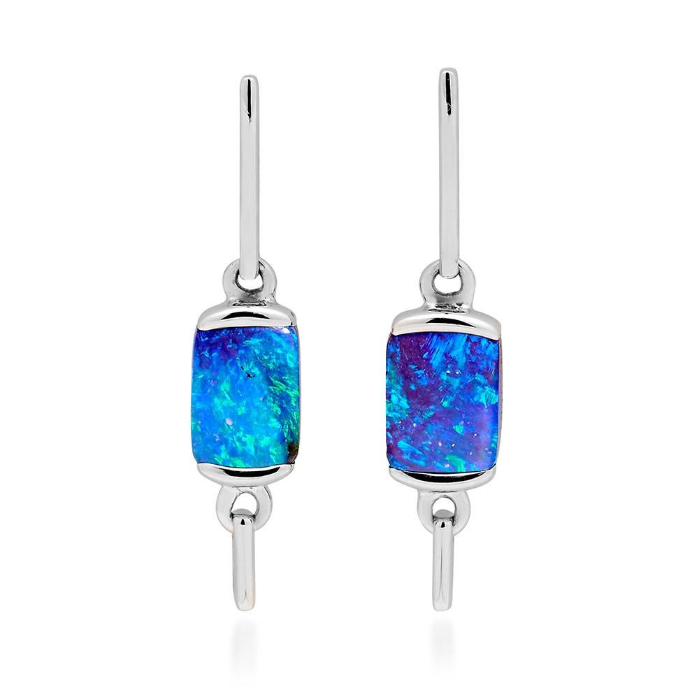 Striking, minimalist and a little bit different, “Heidi” opal earrings present stunning boulder opals (2.25ct) set in cool crisp 18K white gold. Designed by Renata Bernard for the woman who understands the power of understated glamour. These