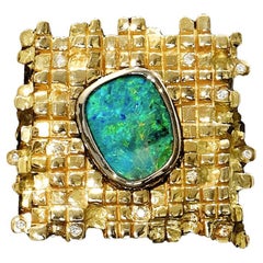 Australian 2.30ct Boulder Opal, Diamond
18k Gold Ring Australian 2.30ct Boulder Opal, Diamond
18k Gold Ring