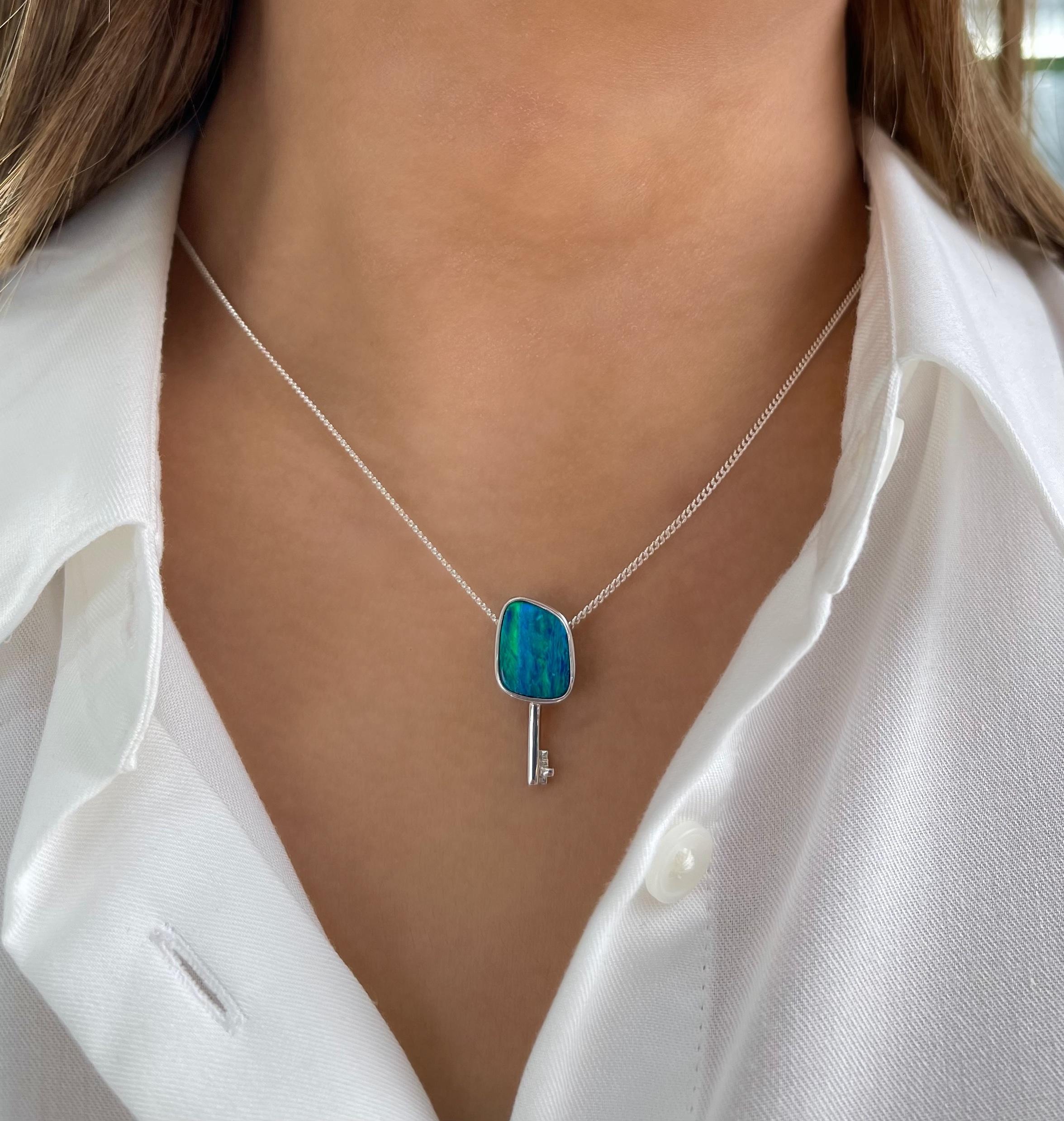 Graceful and alluring is the wearer of the 'key to your heart’ opal pendant, featuring a premium quality Australian opal doublet (3.44ct) sourced from Coober Pedy, Australia. Set in our elegant sterling silver, this stunning and sophisticated opal