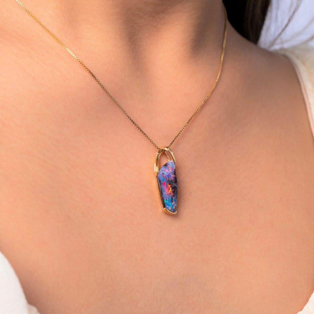 'Red Planet's Petal' opal pendant channels magnificent red, the rarest of all opal colours, straight into your heart, gently and persuasively.  Natural, untreated Australian boulder opal (5.40ct) was sourced in Winton opal mines. Set in stunning 18K