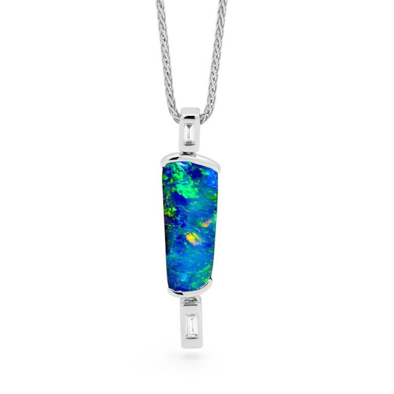 “My Blue Reef” opal pendant was created for the woman who favours simple elegance with a touch of audacity. The bright boulder opal (5.52ct) from Winton in a striking 18K white gold setting is accented by two icy baguette-cut diamonds. Perfect for