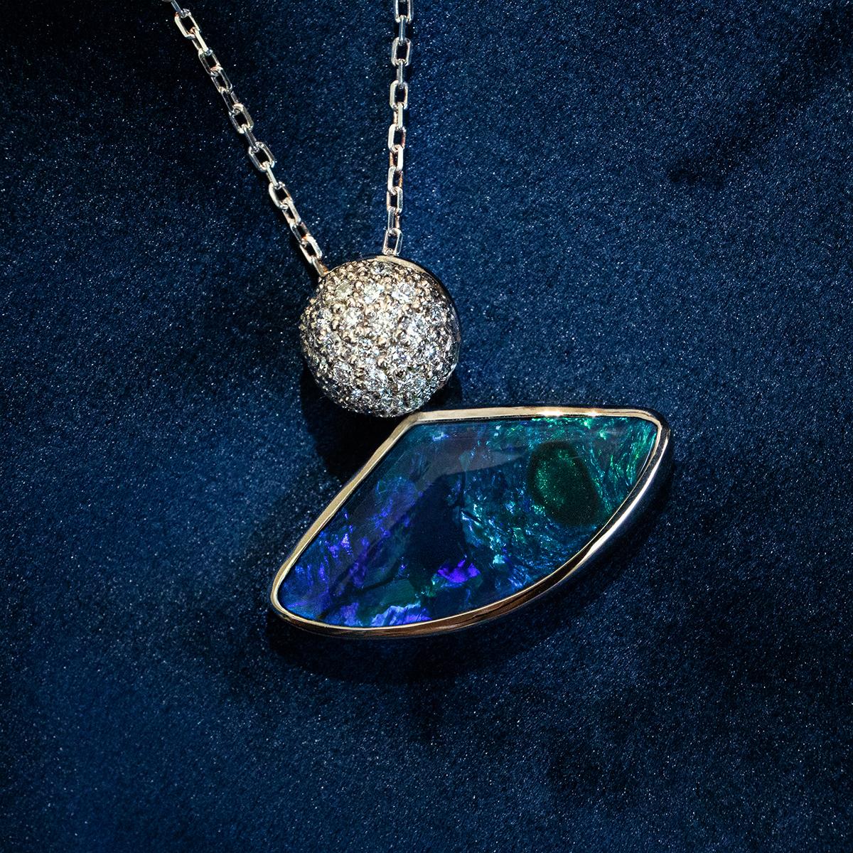 Redefining classics is a strong design influence for the team at Gryffin Opal. Our goal is to give new and modern pieces a classic feel while retaining their fresh appeal. This beautiful pendant embodies that ideal. It features a stunning black opal