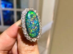 Australian Black Opal and Diamond Cluster 18 Karat Gold Ring