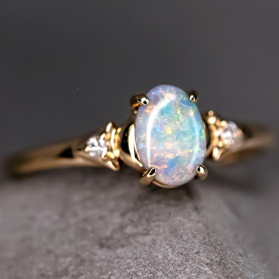 Australian Black Opal & Diamond Engagement Wedding Ring in 18k Yellow Gold.


Free Domestic USPS First Class Shipping! Free Gift Bag or Box with every order!

Opal—the queen of gemstones, is one of the most beautiful gemstones in the world. Every