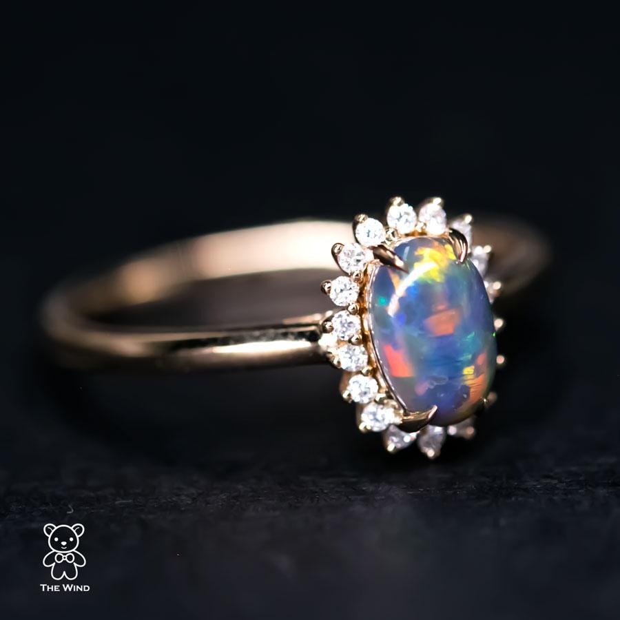 Australian Black Opal Diamond Halo Engagement Ring 18K Yellow Gold.


Free Domestic USPS First Class Shipping! Free Gift Bag or Box with every order!

Opal—the queen of gemstones, is one of the most beautiful gemstones in the world. Every piece of