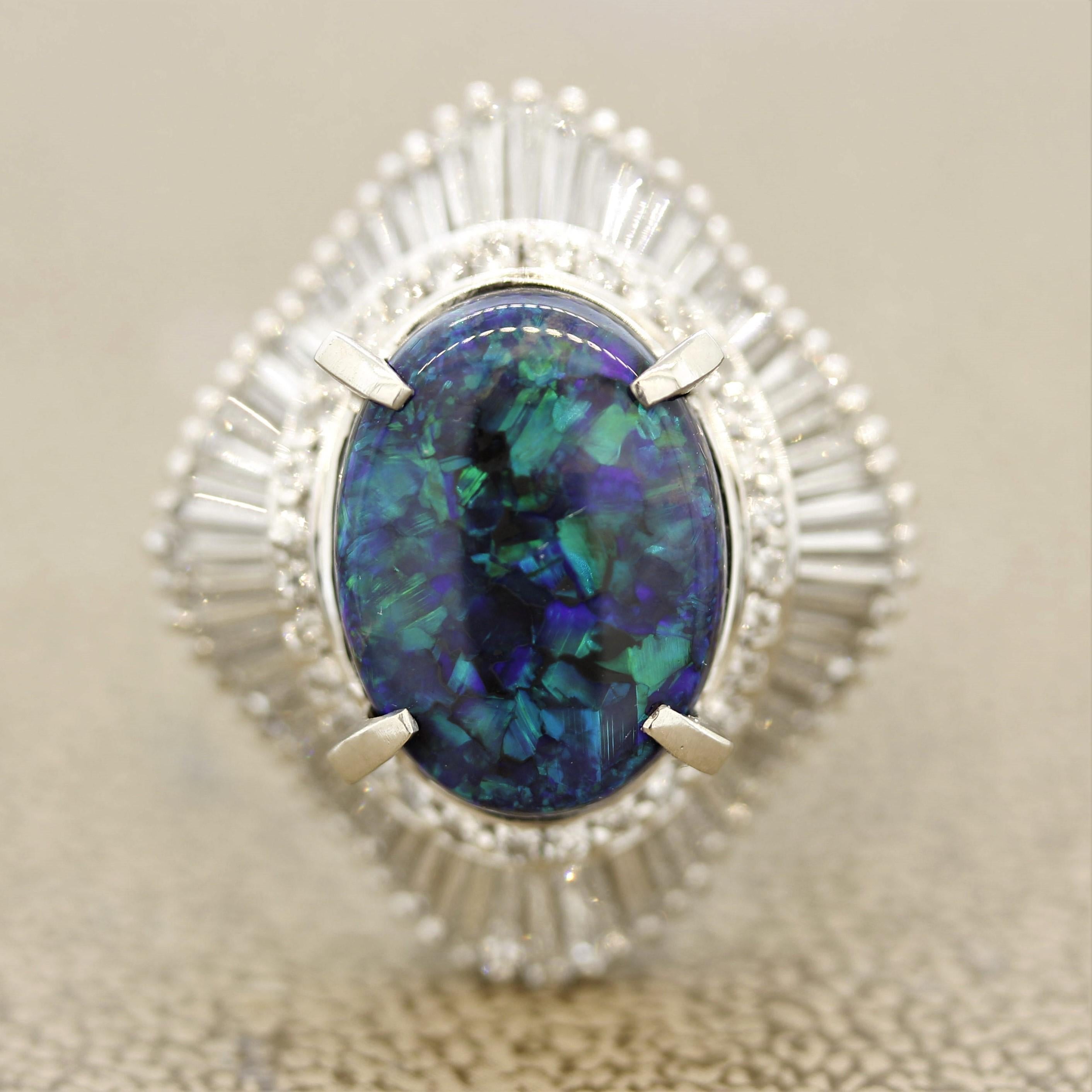 A lovely platinum cocktail ring featuring a 4.51 carat Australian black opal. It is a classic blue-green opal with excellent play of color as bright flashes roll across the surface of the stone. It is accented by 1.52 carats of round brilliant and