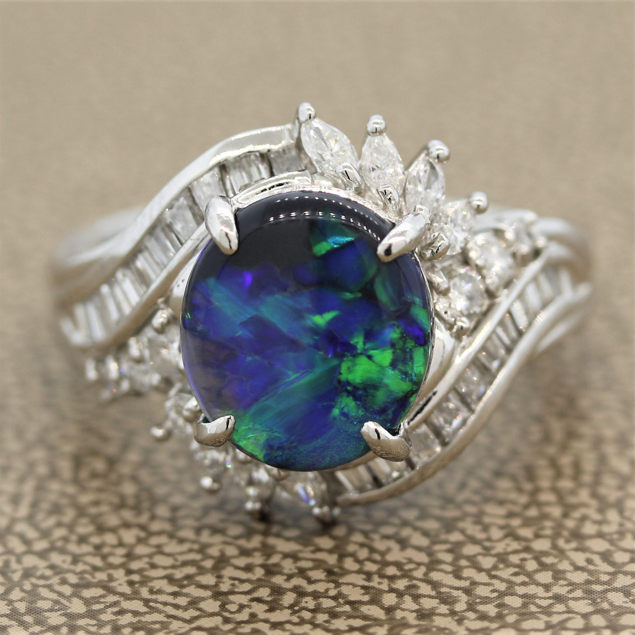 A classic blue-green black opal from Lightning Ridge, Australia. It weighs 2.16 carats and shows bright strong flashes of green and blue. It is accented by 0.93 carats of round brilliant, marquise and baguette cut diamonds set in a swirl pattern