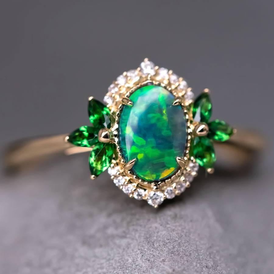 Australian Black Opal Diamond Tsavorite Engagement Ring 18K Yellow Gold.


Free Domestic USPS First Class Shipping! Free Gift Bag or Box with every order!

Opal—the queen of gemstones, is one of the most beautiful gemstones in the world. Every piece