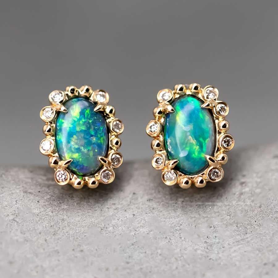 Australian Black Opal & Halo Diamond Stud Earrings 18k Yellow Gold.


Free Domestic USPS First Class Shipping! Free Gift Bag or Box with every order!

Opal—the queen of gemstones, is one of the most beautiful gemstones in the world. Every piece of