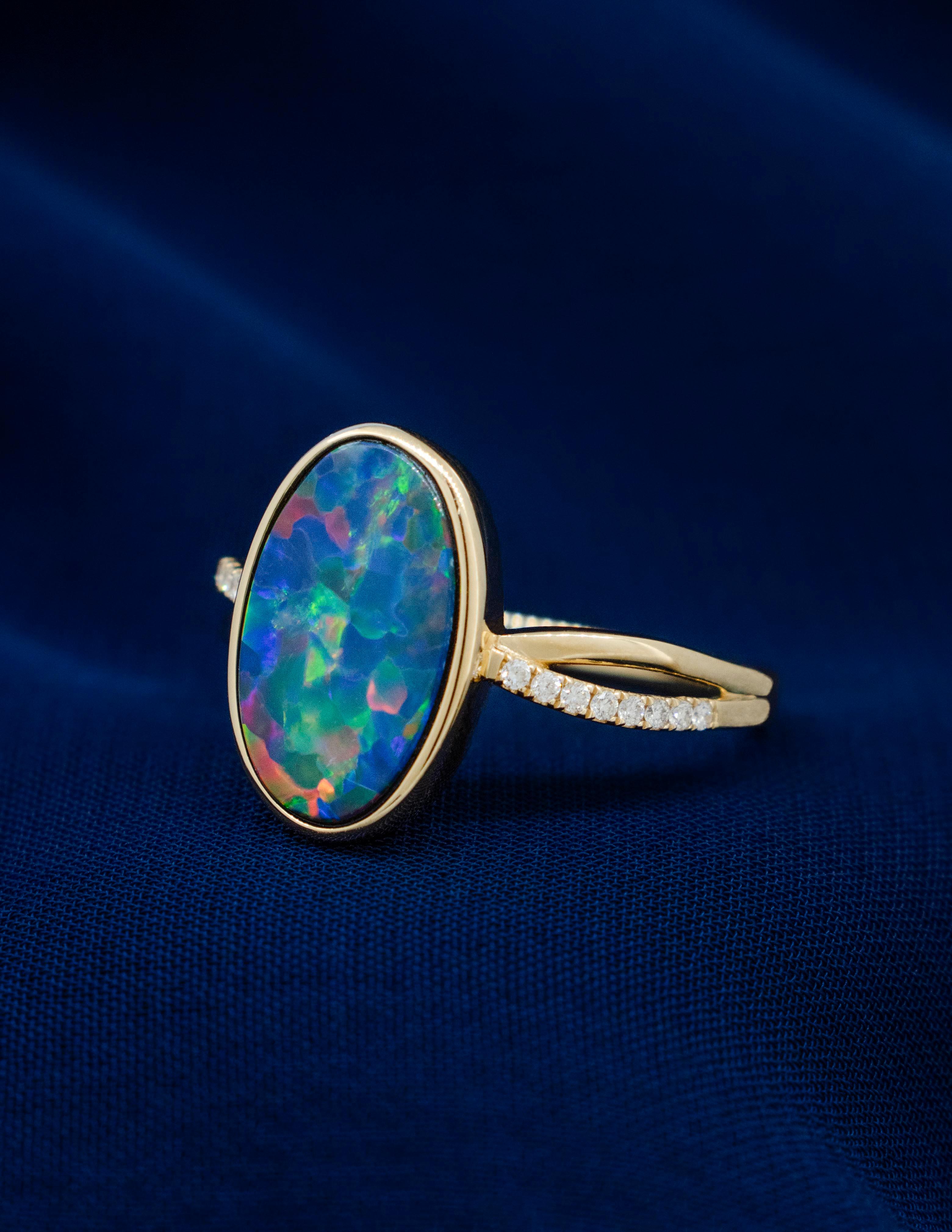 Australian Black Opal Ring with Diamonds made of 14 karat Yellow Gold In New Condition For Sale In Boone, NC