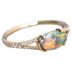 Bague de fiançailles à tige fendue en or 18K avec pavé en opale noire australienne