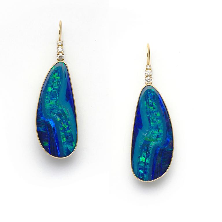Big, Bold and Beautiful Boulder Opals. Striking in their size, color and luster, Diamonds (0.30 Carat) are added to fully set off the brilliance of the Opals.