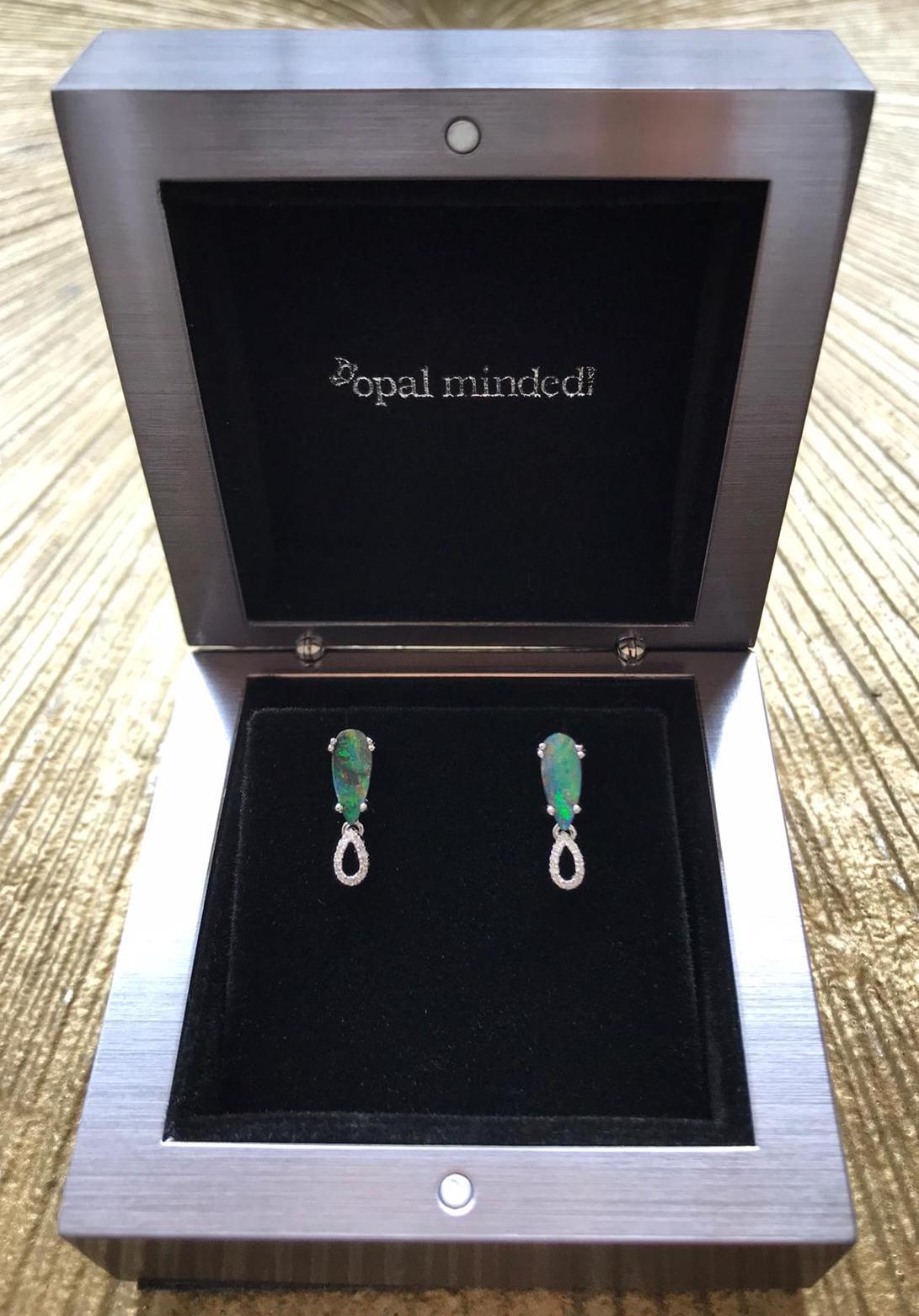 “Topsy Turvies” opal earrings feature a stunning duo with a dramatic play-of-colour.  Winton boulder opals (1.49ct) are set in 18K white gold and finished with effervescent diamonds. The perfect gift for the one who turned your world upside down.
